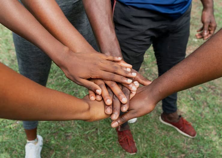 People joining hands in partnership